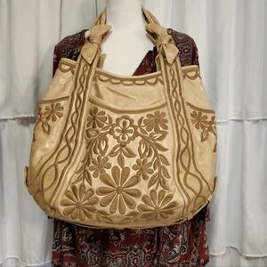 Beautiful bohemian Beige leather hobo bag with floral embroidery